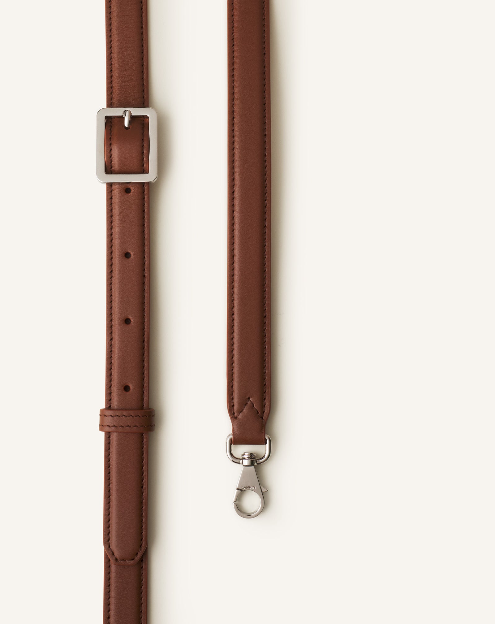 COMPAGNON ASYMMETRICAL LEATHER CLUTCH BAG