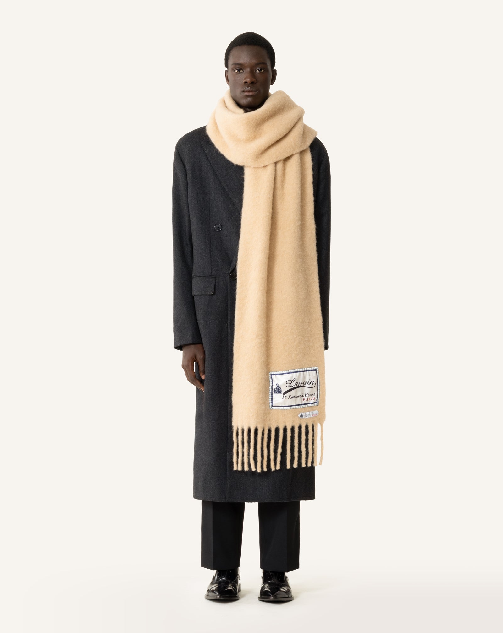 FRINGED WOOL SCARF WITH 22 FAUBOURG LABEL