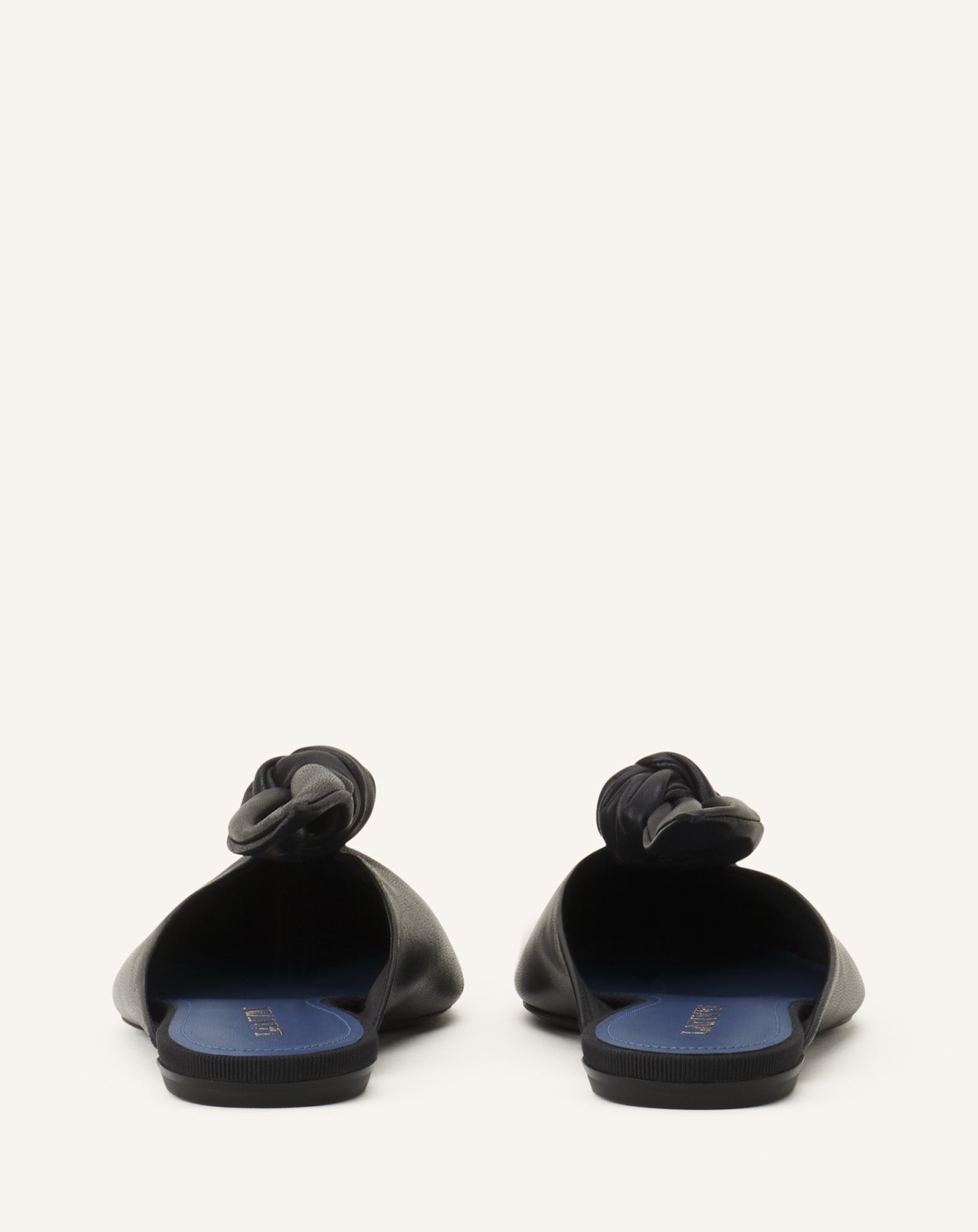 BLACK MIDNIGHT STEP MULES WITH A LEATHER BOW