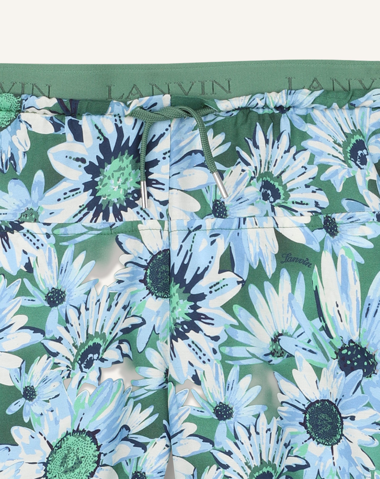 GREEN PRINTED BERMUDA SHORTS